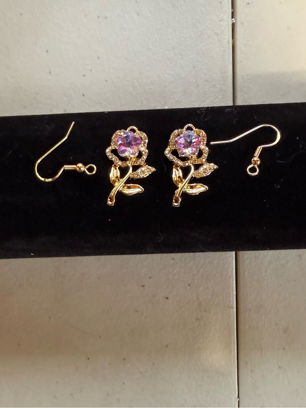 Gold Floral Drop Earrings with Purple Crystal Accent